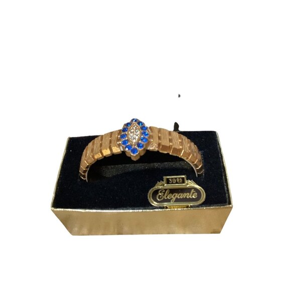 1970s Bangle Bracelet By Elegante Sapphire Blue Rhinestone Gold Tone-NOS MCM - Picture 1 of 8